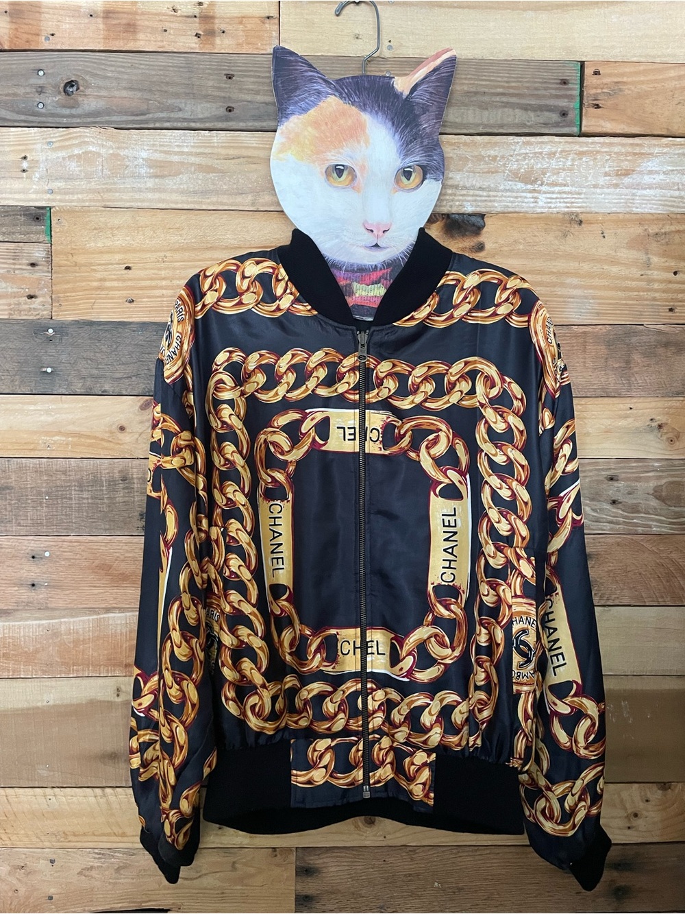 CHANEL Black Bomber Jacket with Gold Chain Print